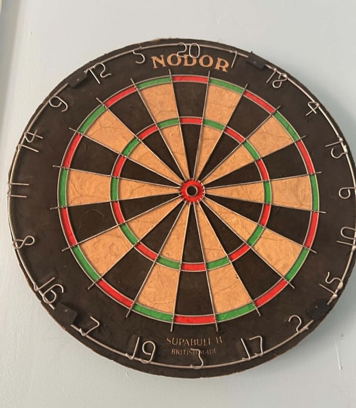Vintage dart board and darts made in england