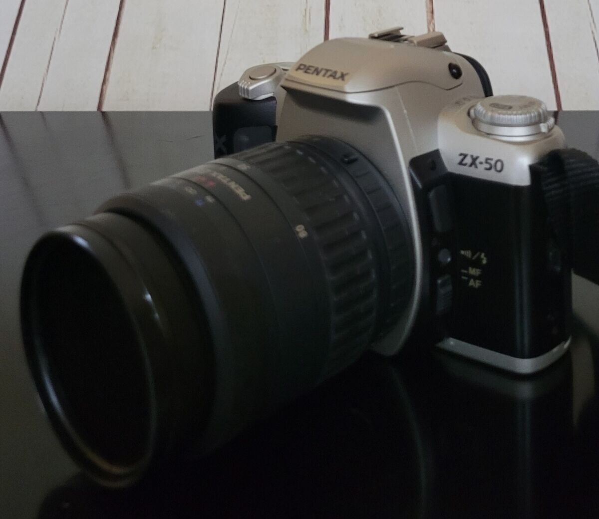 Pentax ZX-50, 28-80MM Lens(SMC FA 1:3.5 - 5.7) 35mm Camera + FTD 7000M  FLASH.