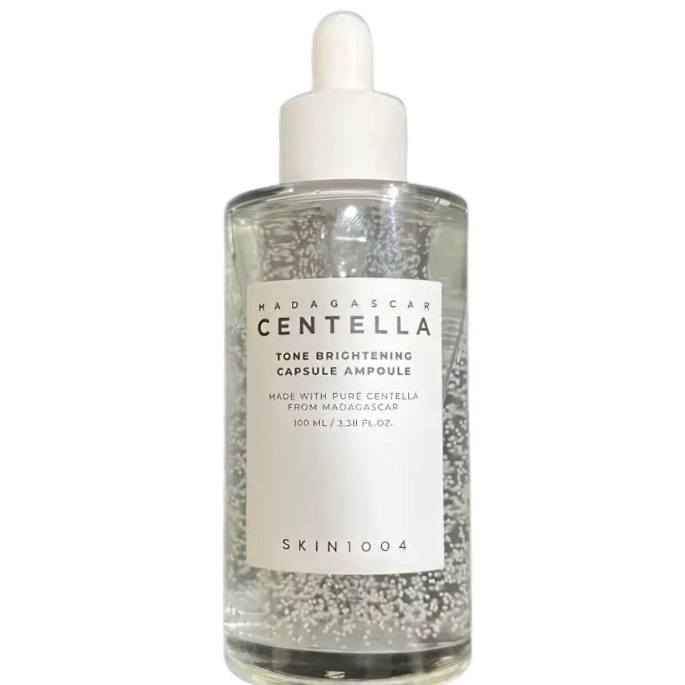 Ampolla cápsula iluminadora tono centella SKIN1004 Madagascar 100 ml EXP 11/2025 Foto 2 de 3