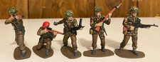 1/32 plastic WWII British Paratroopers in camouflage uniforms made by Airfix.