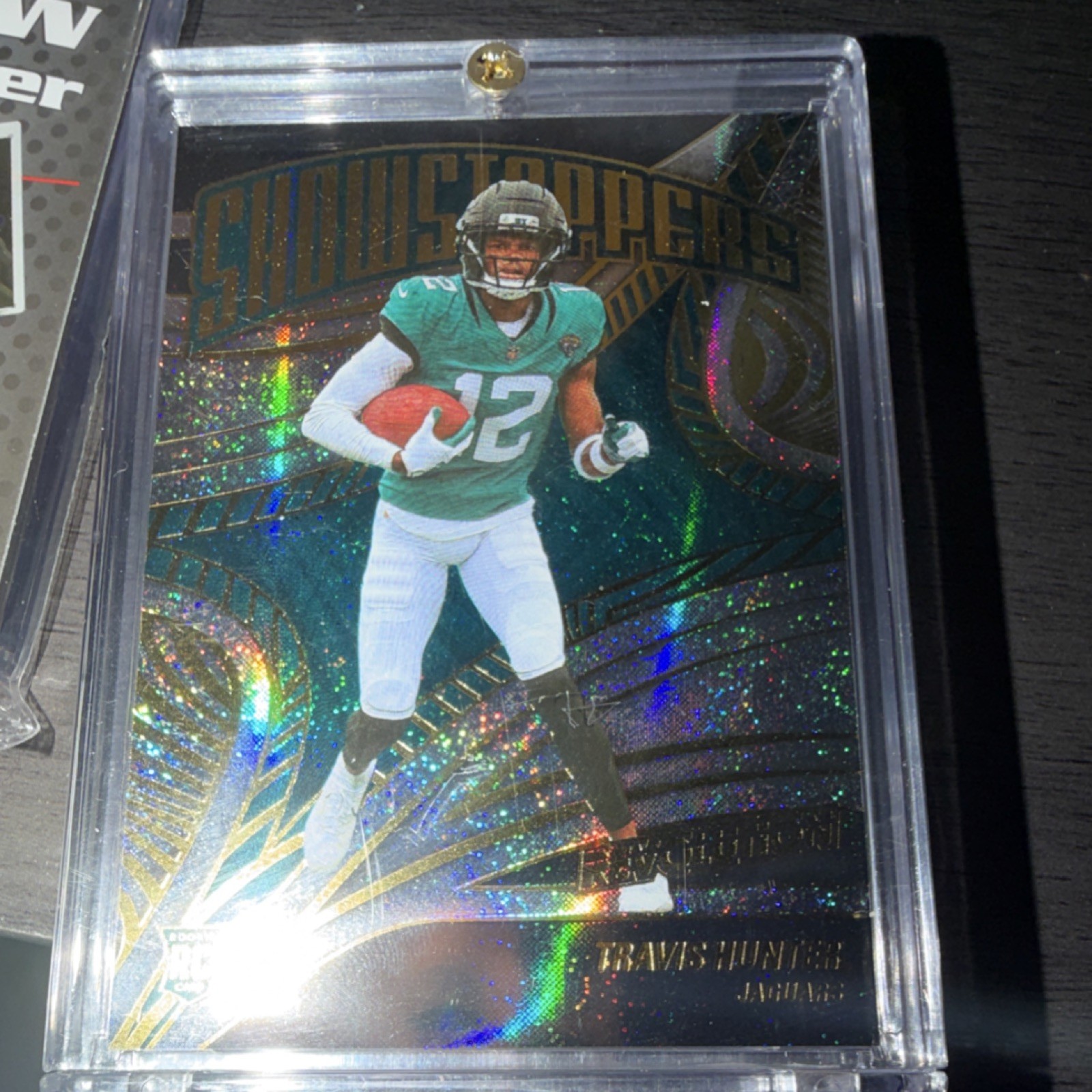 2025 Panini Revolution Showstoppers Travis Hunter #19 Neutron /30 Jaguars (RC)