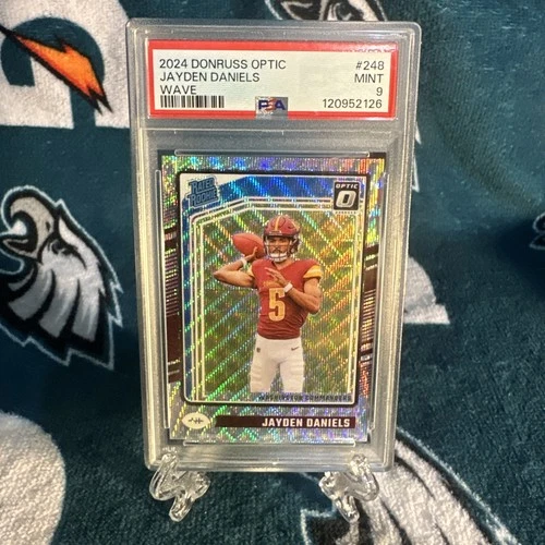 2024 Donruss Optic Rated Rookie Jayden Daniels #248 Wave Prizm /300 (RC) PSA 9