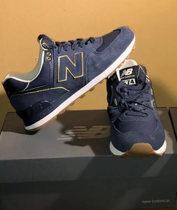 new balance 574 blue gold