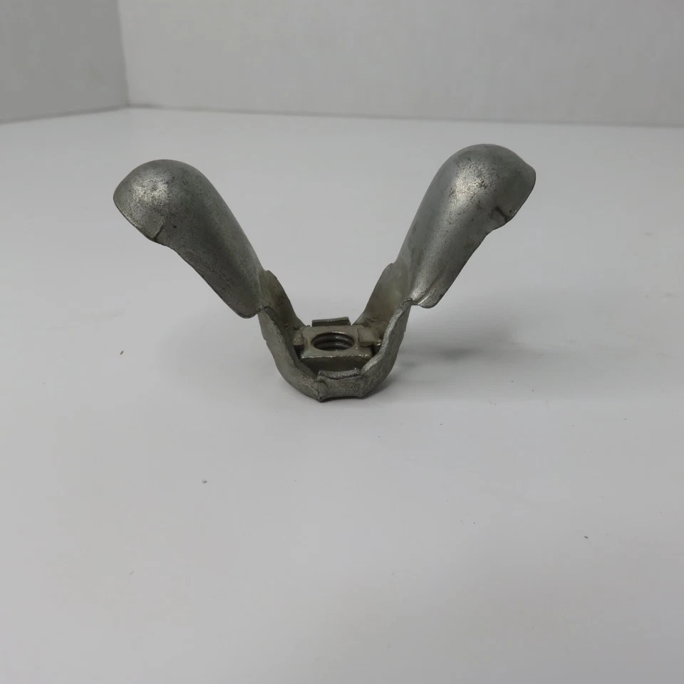 Tuerca de ala de gato Ford NOS E6DZ-1462-A fabricante de equipos originales Foto 3 de 4