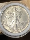 PREMIER YEAR 1986  SILVER EAGLES YEAR 1.  1 Troy Oz .999 Fine Silver  date