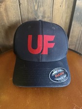 black Flexfit hat features a prominent red embroidered "UF" logo