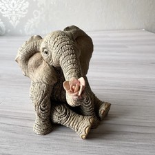 Tuskers Elephant Clarence With Flower Figurine Paw Prints Vintage 1995 Ornament