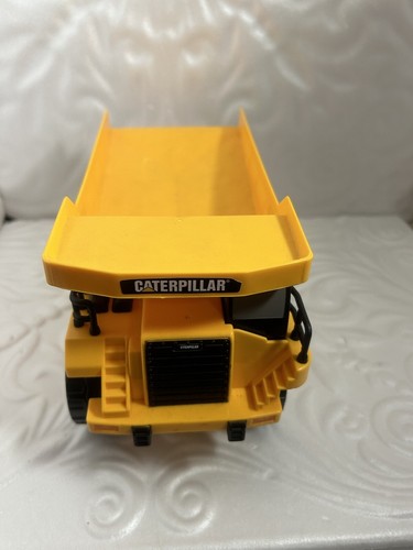 Camion benne chenille chat jaune Toy State avec mouvement, sons et lumières - Photo 6 sur 12