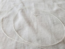 White Radio Dial Cord  .4mm  sold in 12 foot lengths