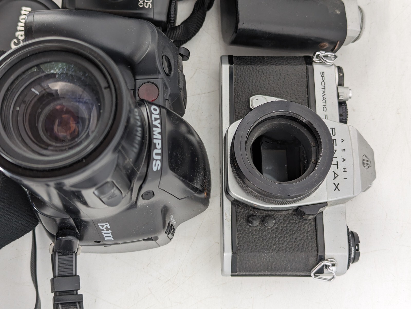 Job Lot Vintage Film SLR Cameras Canon / Zenit / Olympus etc *Spares