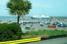 PHOTO  ROSSLARE HARBOUR TAKEN FROM THE COACH BEFORE IT DESCENDS TOWARDS THE HARB
