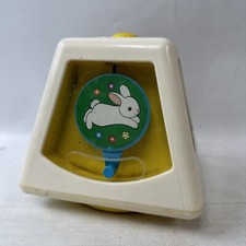Fisher Price 1978 Turn And Learn Baby Toy centro de actividades vintage tiene ropa