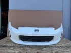 NISSAN 370Z 2013-2021 OEM FRONT BUMPER COVER W/ GRILLE ASSEMBLY WHITE (QAB)