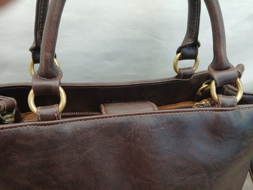 Attractive Faux Leather Crossbody Or Handbag With Decorative Cut Outs. - Picture 5 of 15