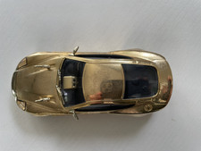 James Bond 007 40th Anniversary Gold Aston Martin V12 Vanquish. CORGI CC07505