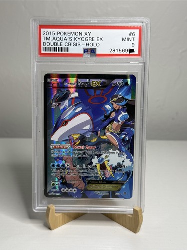 Team Aqua's Kyogre-EX graded PSA 9 for sale on eBay