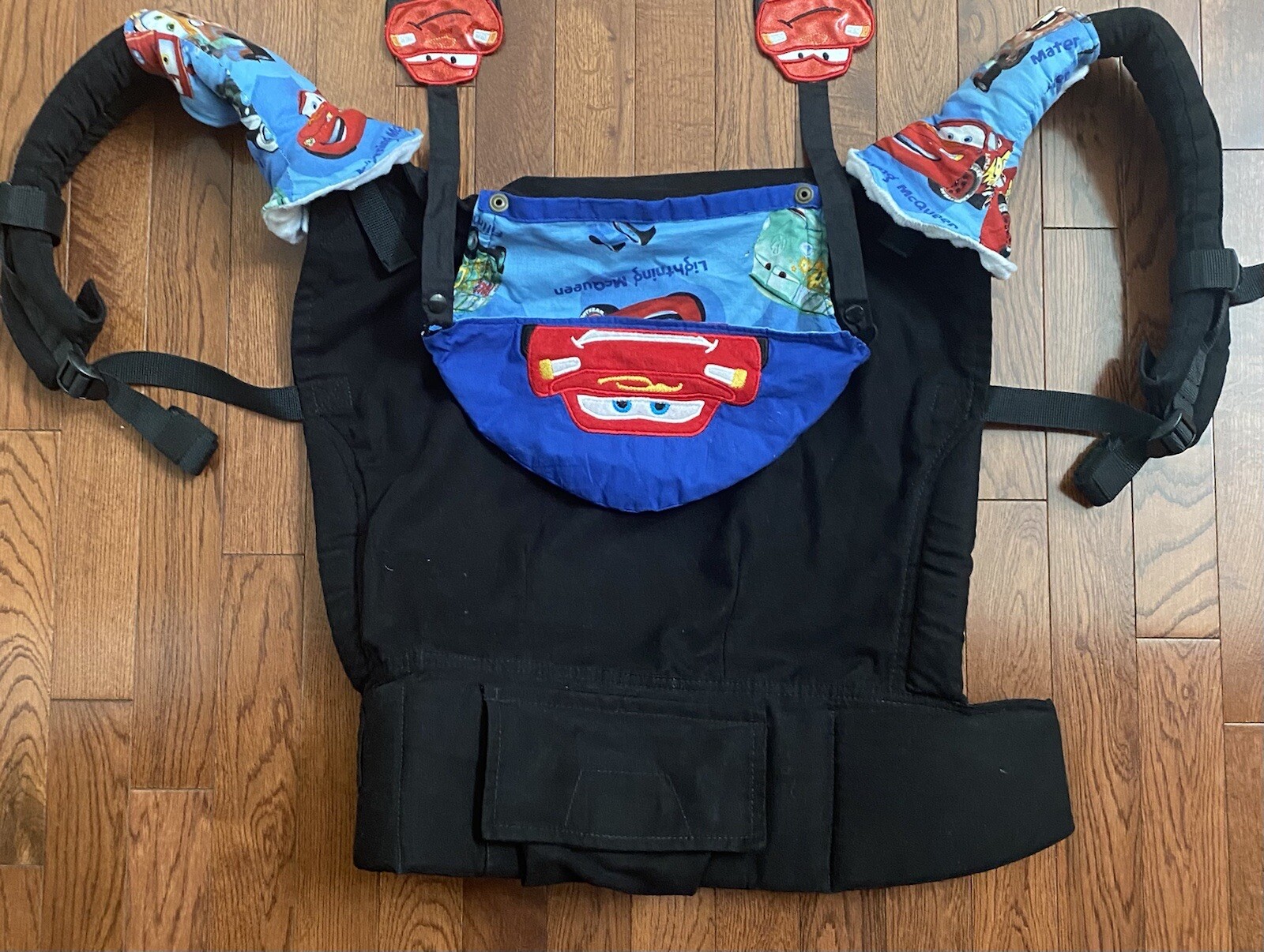 Tula custom Disney Lightning McQueen reach straps, suck  pads, and hood.