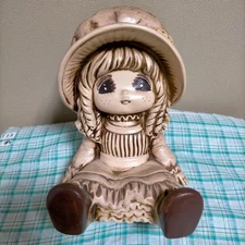 As is a ceramic Jeje-chan sitting piggy bank