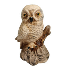 Vintage Owl figurine light brown on branch, yellow eyes, 5" H