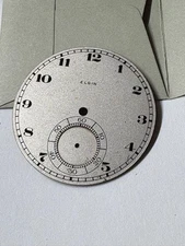 ELGIN 12 SIZE SILVER METAL DIAL 40 MM DIAMETER --BB-1995