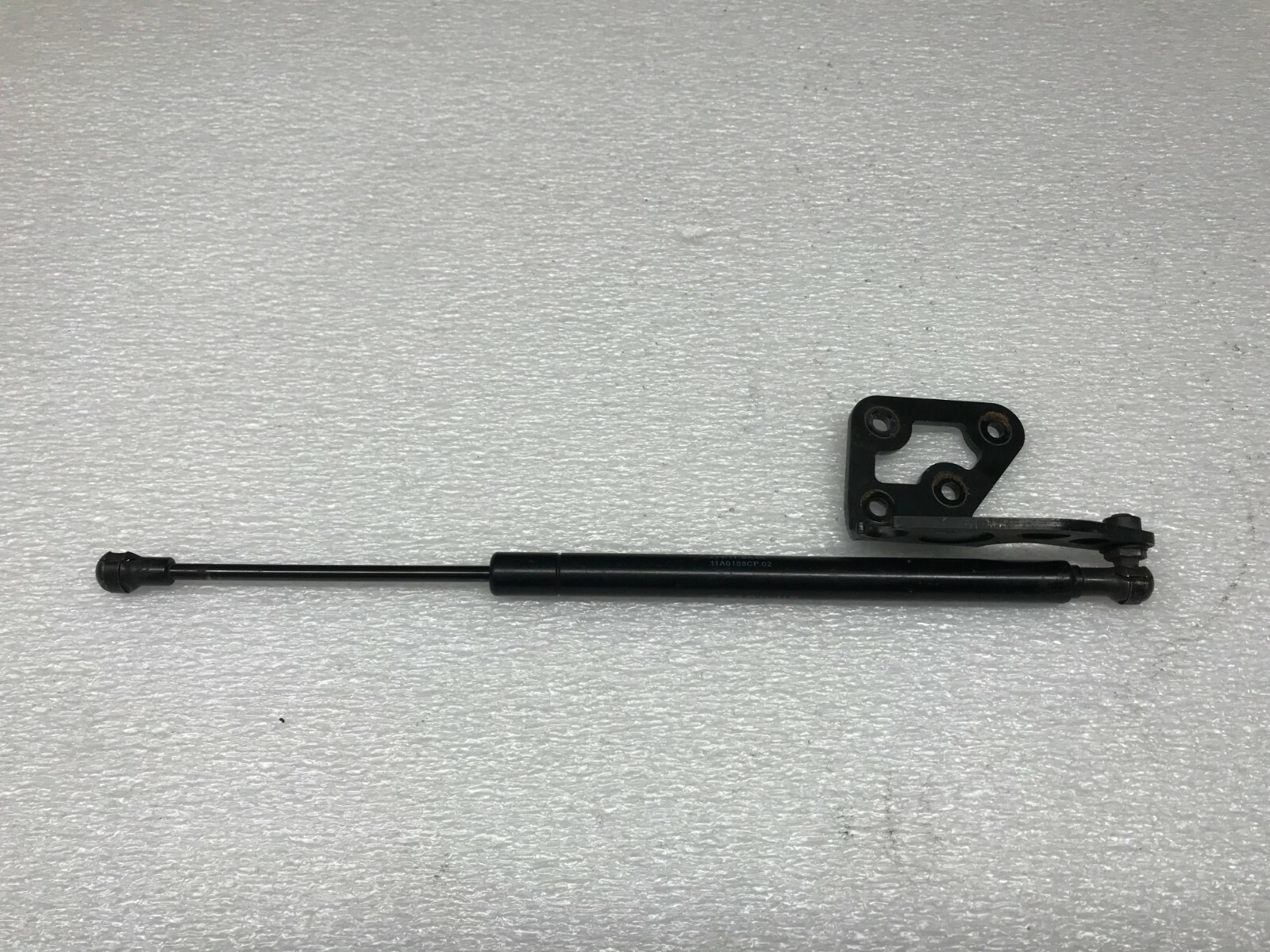 MCLAREN MP4-12C GAS SPRING SHOCK WITH BRACKET OEM 11A0188CP