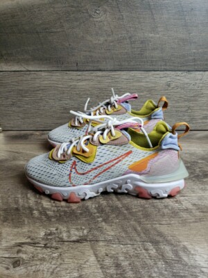 nike react vision trainers in white yellow and pink