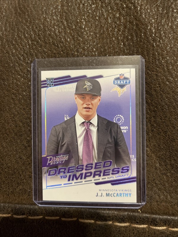 2024 Prestige Football JJ McCarthy #DTI-JMY Dressed to Impress Card