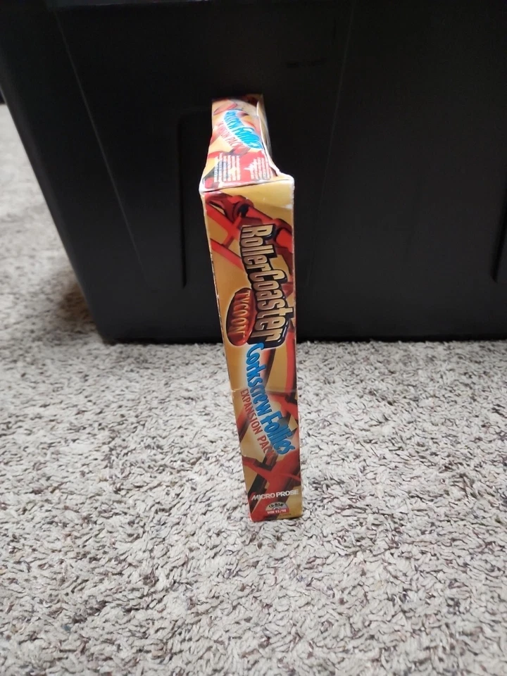 RollerCoaster Tycoon Sacacorchos Locuras Paquete de Expansión Caja Grande PC 1999 Sellado  Foto 2 de 4