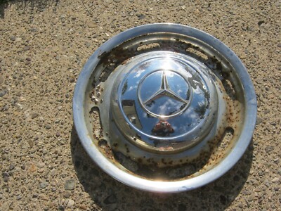 One factory Mercedes Benz W186 Adenauer hubcap rusty