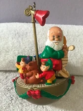 Vintage Noma Christmas ornament Santa w/list elves & toys EX3455