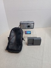 Canon PowerShot S40 Digital Camera  Charger, No Battery. Working ?