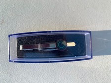 Tie clip eye logo