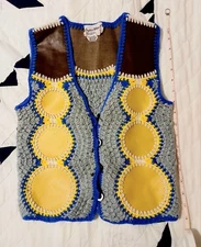 Vintage 70’s English Village  crochet  /faux leather vest..circles...size Med.