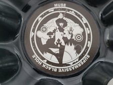 vinyl record plecktrum bowl,muse supermassive black hole,naked lady,guitar pick