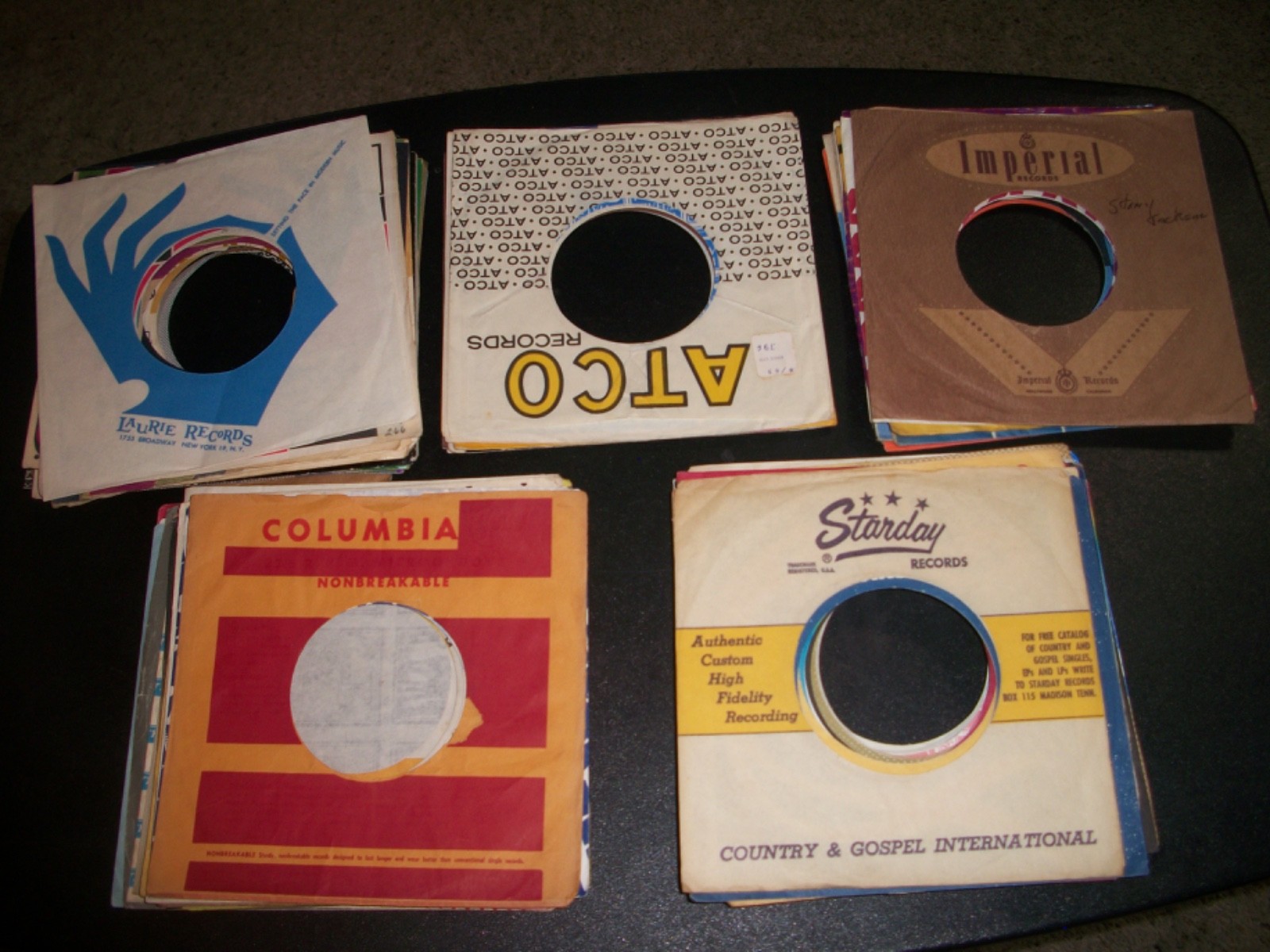 65 Different 45 RPM Company Record Sleeves-Used-Excellent condition