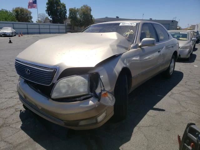 Lexus LS400 2000 lado del pasajero derecho manija de puerta delantera pintura dorada 4P7 Foto 3 de 4