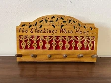 The Stockings were hung 6 hanger wall hooks for Christmas handmade wood