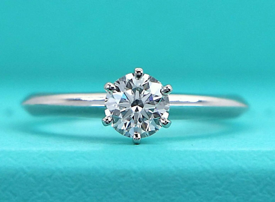 $8,000 Tiffany & Co Platinum Solitaire 0.65ct H VS2 Diamond
