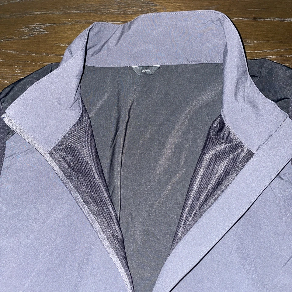 Chaleco de running transpirable de resistencia CW-X para mujer. Gris carbón mediano/grande Foto 2 de 4