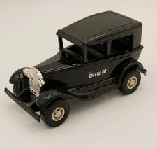 Vintage Tonka Black Ford Sedan Rat-A-Tat-Tat Diecast Car, Made In USA