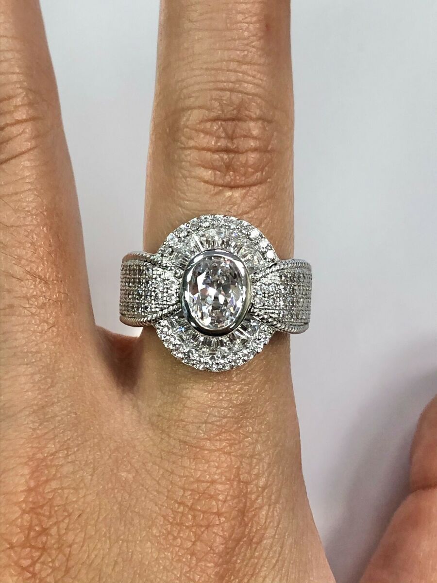 Fabulous 1.5 CT Oval Clear CZ 925 Silver Thick Halo & Band Fabulous 1.5 CT Oval Clear CZ 925 Silver Thick Halo & Band