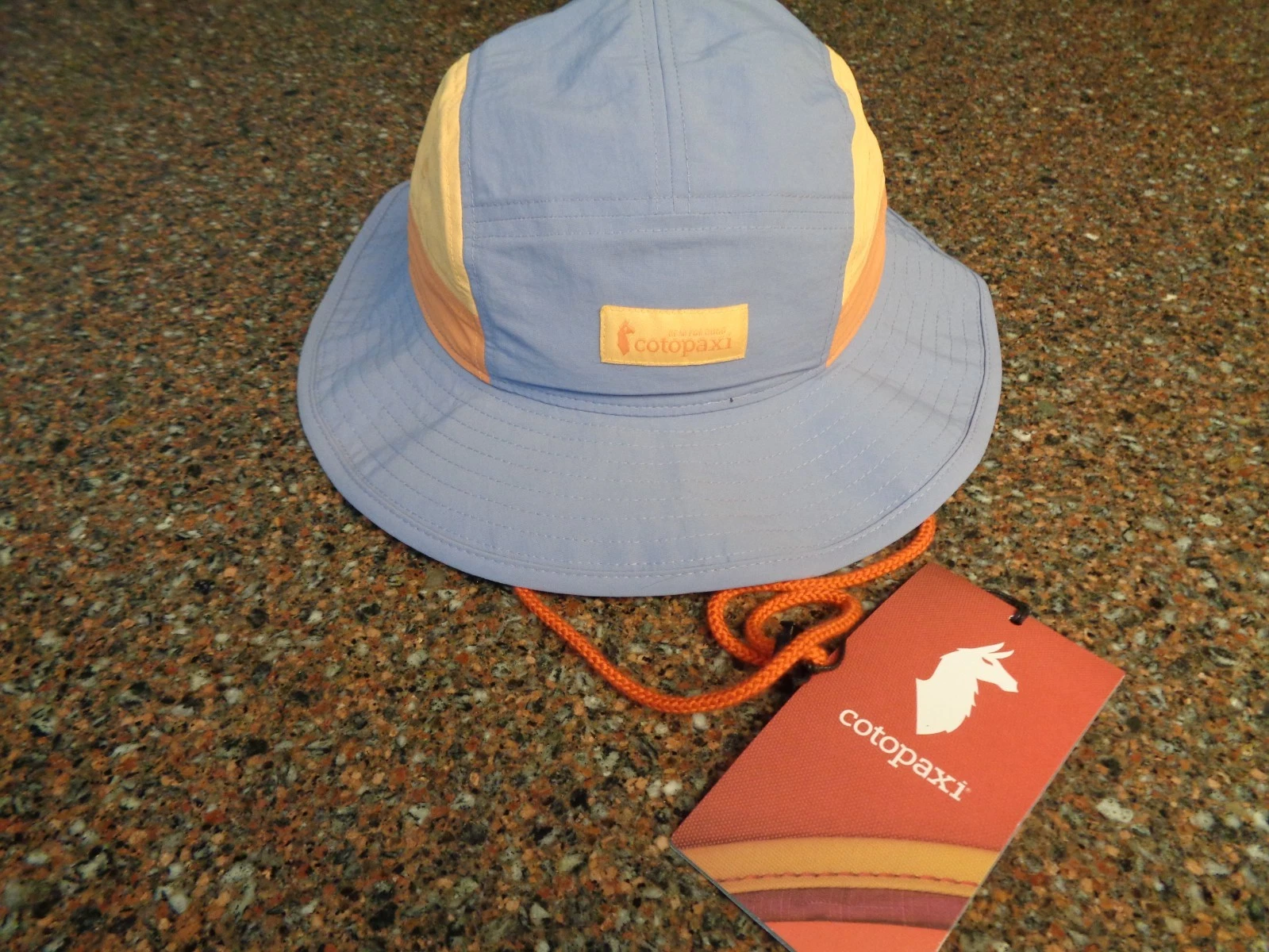 Cotopaxi Tech Bucket Hat Aster Adjustable Cord Woven Patch Sun Protect NWT
Opens in a new window or 