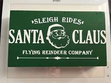 Sleigh rides Santa Claus Christmas sign 