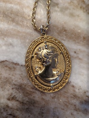 vintage Revlon women's gold tone chain with metal cameo charm