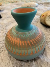 Signed Dina J navajo pottery nice teal colors