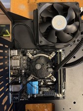 Intel Core I7-4790k + ASRock H97M-ITX + 16 GB Ballistix Sport DDR3 1600 RAM + AIO