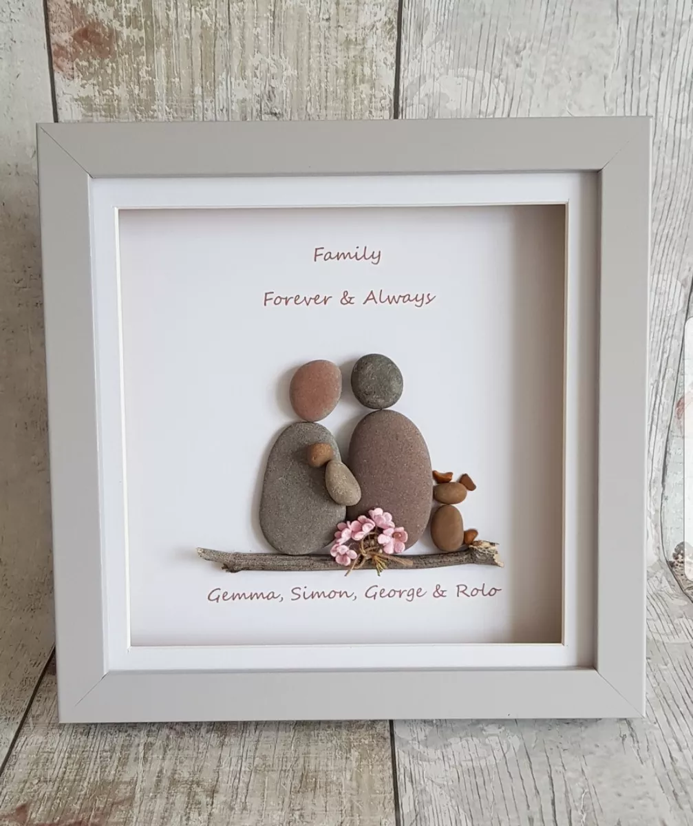 Pebble art top couple with dog