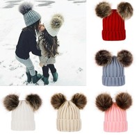 New Baby Fashion Winter Double Pom Pom Hat Warm Bobble Knitted Hat Boys Girls UK