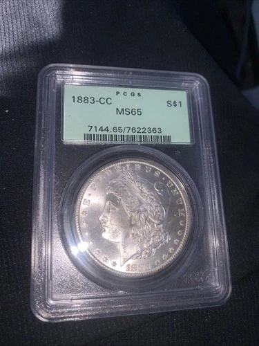 1883 CC MORGAN SULVER DOLLAR MS 65