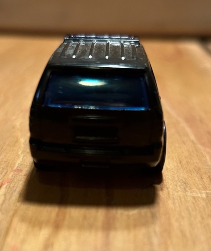 Loose Hot Wheels Gotham City PD ‘07 Chevy Tahoe - Picture 5 of 7